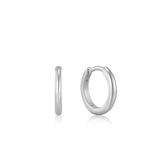 Silver hoop earrings on a white background